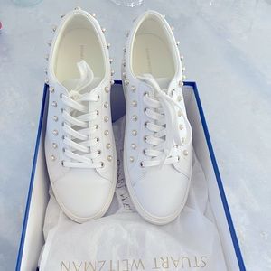 Stuart Weitzman, white sneaker! Classy and comfortable. Worn one time indoors.